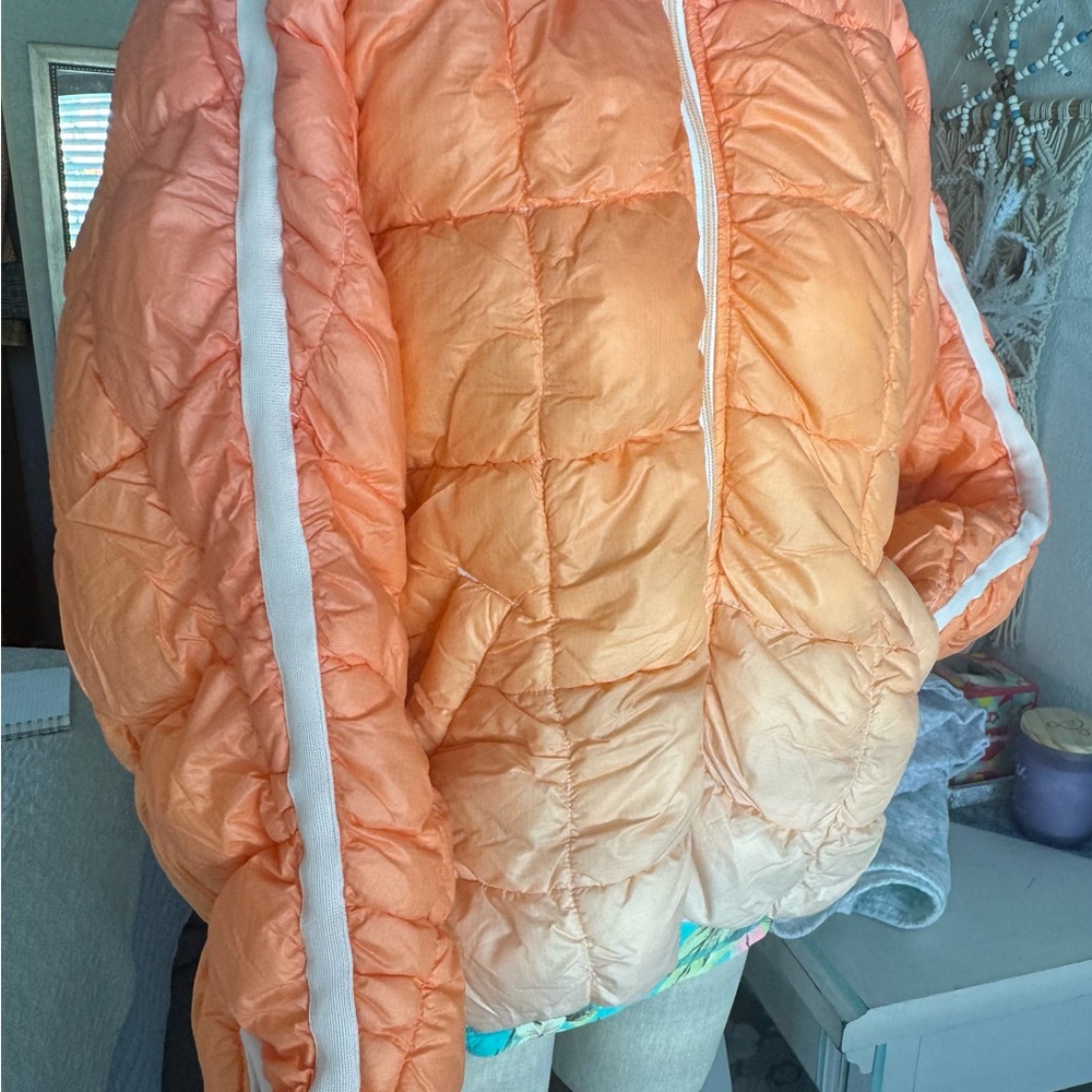 Orange Puffer Jacket with White Stripes